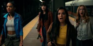 The cast of Madame Web looking shocked in the subway